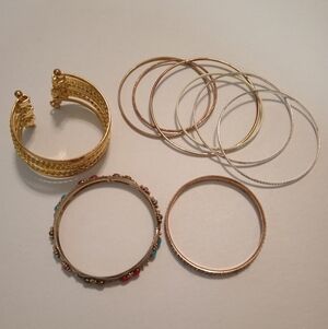 #404.  9 Piece Assorted Bracelet Bundle